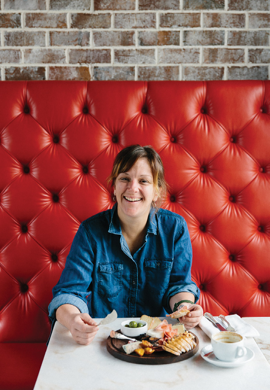 CHEESE SHOP: goat.sheep.cow; Warehouse chef Emily Hahn checks out the fromagerie’s new digs on upper Meeting Street.