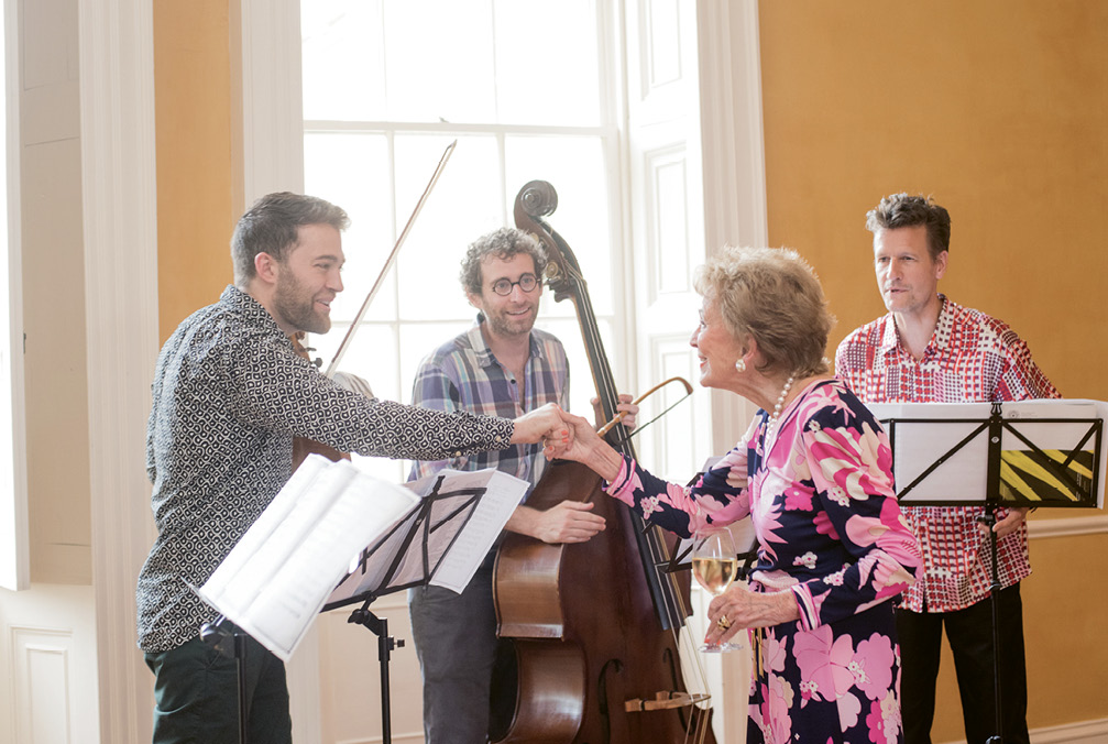 Martha Rivers Ingram, a Spoleto board member and former board chair, introduces herself to Dalby. “We’ve become close with some of Spoleto’s biggest champions,” Nuttall says. “We’ve met amazing and super generous people through the years—some really interesting and cool friends.”