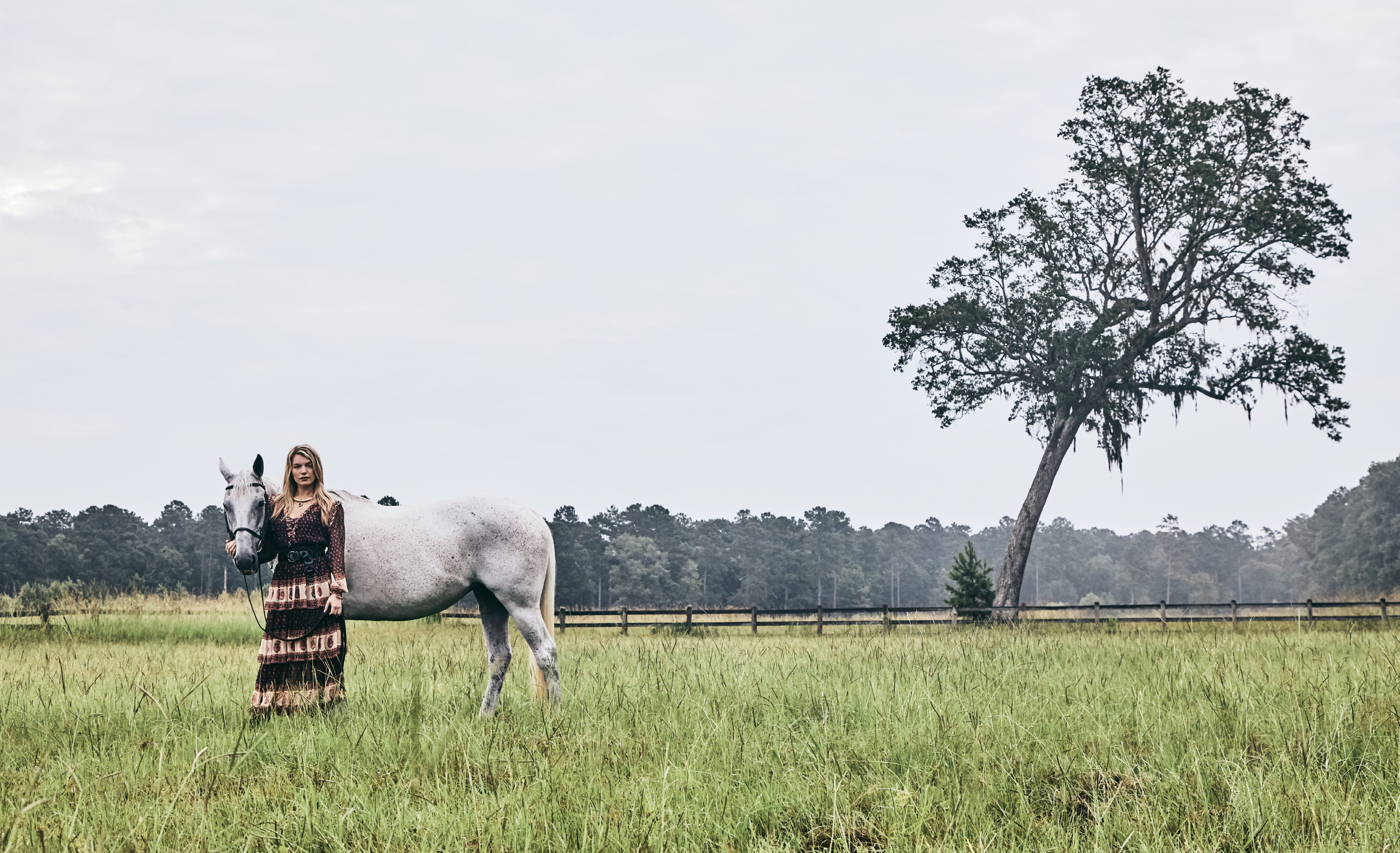 Great Wide Open - Zimmerman “Jaya Stamp” silk layer maxi dress, $1,175 at Hampden; Suzi Roher leather belt, $605 at Gwynn’s of Mount Pleasant; Marco Dominici 20K gold-plate and bronze Roman coin necklace, $632 at The Hidden Countship.  Pictured with Tempest (owned by Christie Ellis)