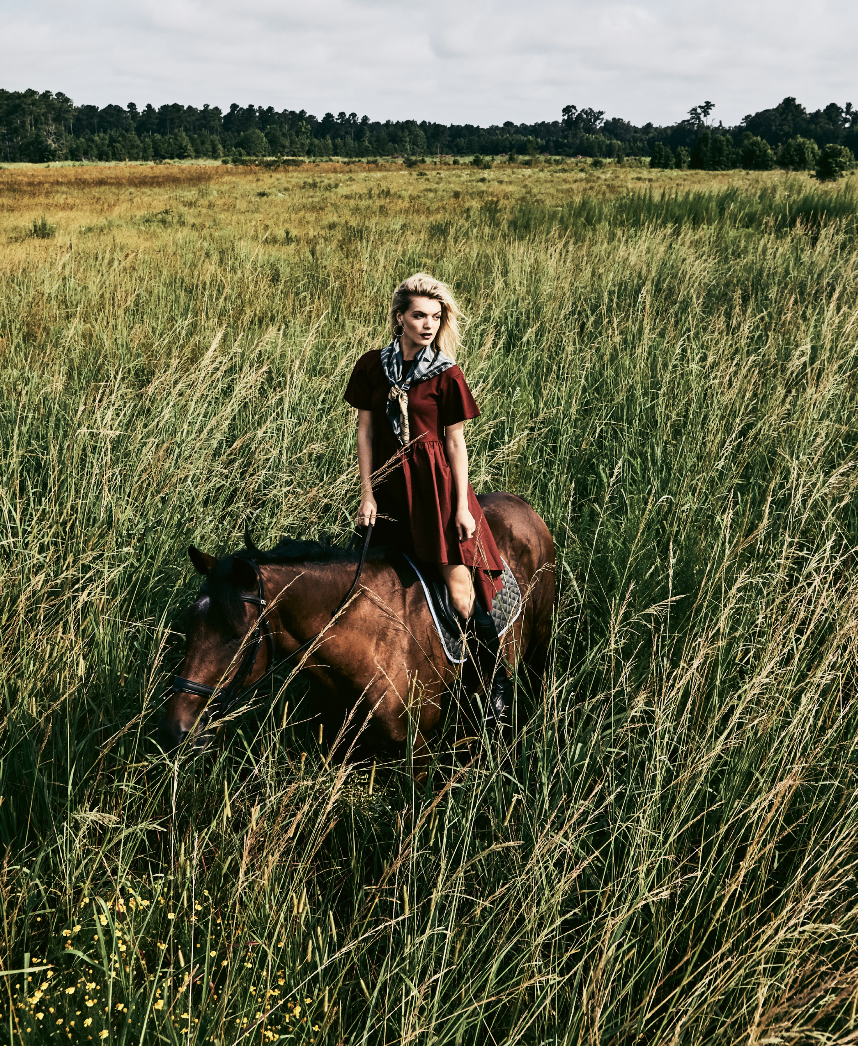 English Factory T-shirt dress, $112 at Maris DeHart; Lafayette 148 New York “Bauhaus Veritas” silk twill scarf in “port blue multi,” $348 at Gwynn’s of Mount Pleasant; mixed-metal hoop earrings, $42 at Tara Grinna Swimwear; estate carnelian intaglio crest ring, $2,800 at Croghan’s Jewel Box; Mountain Horse “Sovereign” leather field boot, $390, and English Riding Supply saddle pad, $25, both at Bits &amp; Pieces.  Pictured on Blarney (owned by Dr. Katie Loewenstine, D.V.M.)