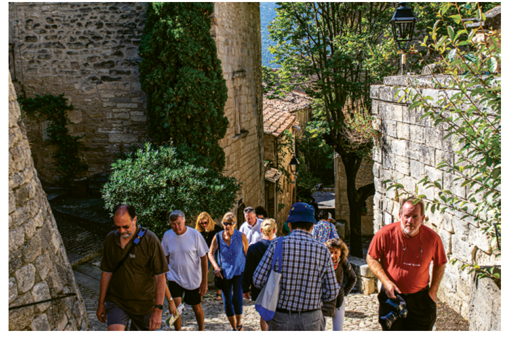 Enjoying the climb in the hilltop village of Bonnieux, France