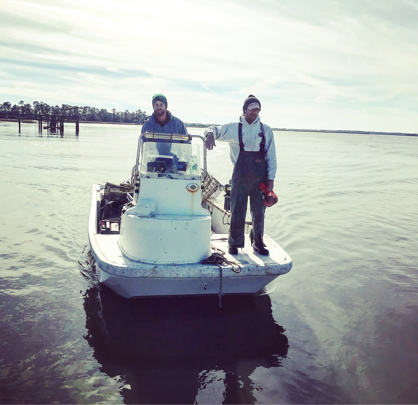 The Bierce brothers head back to the landing on Sol Legare Road after checking and culling their Stono River cages