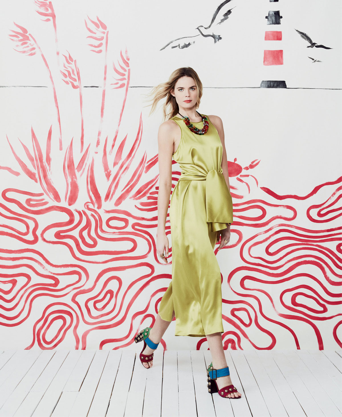 Cynthia Rowley “CBS” silk jumpsuit, $425 at Cynthia Rowley; Elizabeth and James gold-plated topaz “Vago” ring with white sapphires, $135 at Croghan’s Jewel Box; Heather Tiller 14K gold vermeil and green amethyst ring, $110 at Filigree; and Cynthia Rowley multi-color stud sandals, $450 at Cynthia Rowley