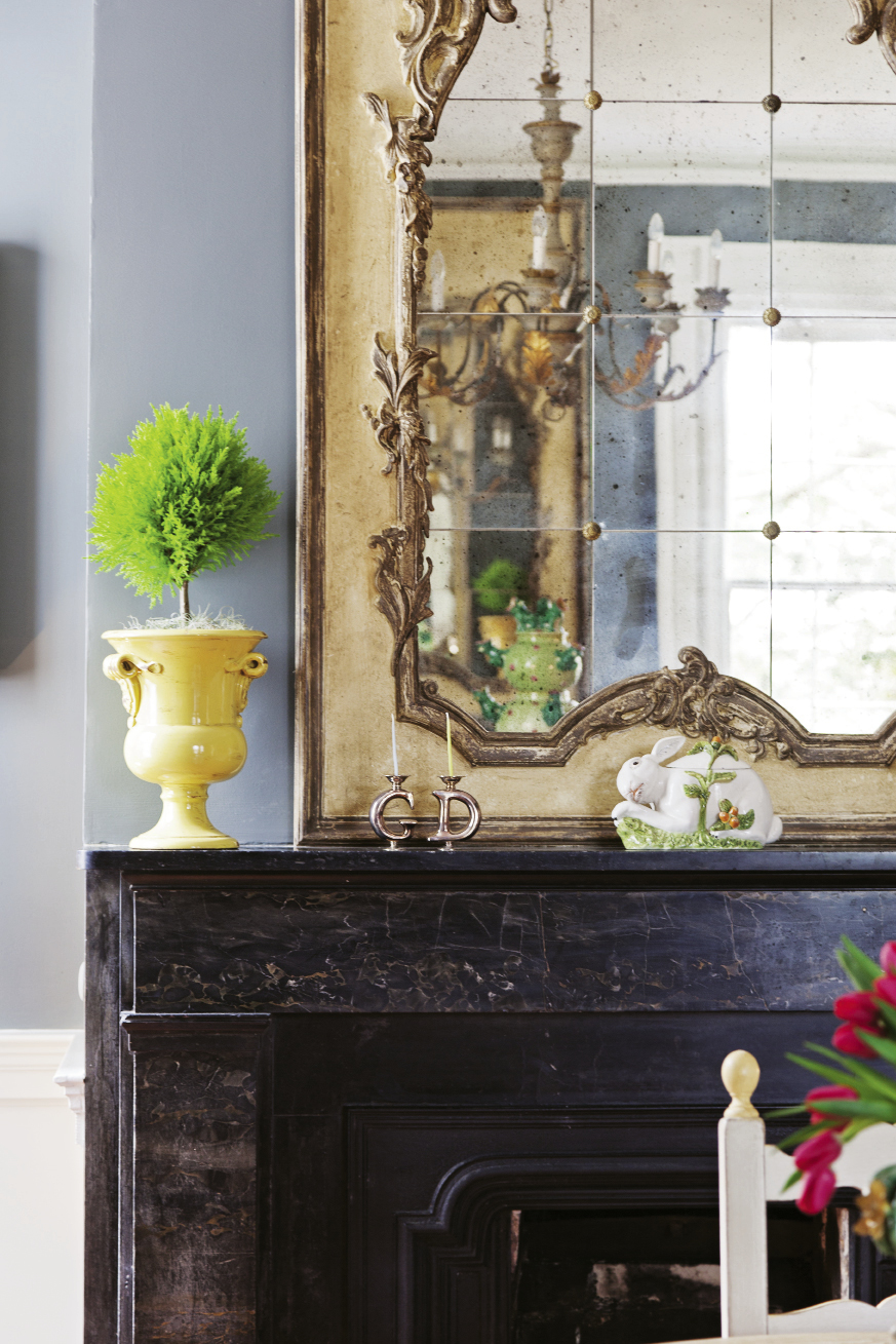 REMINDERS OF HOME One of three Portoro marble mantels original to the house.