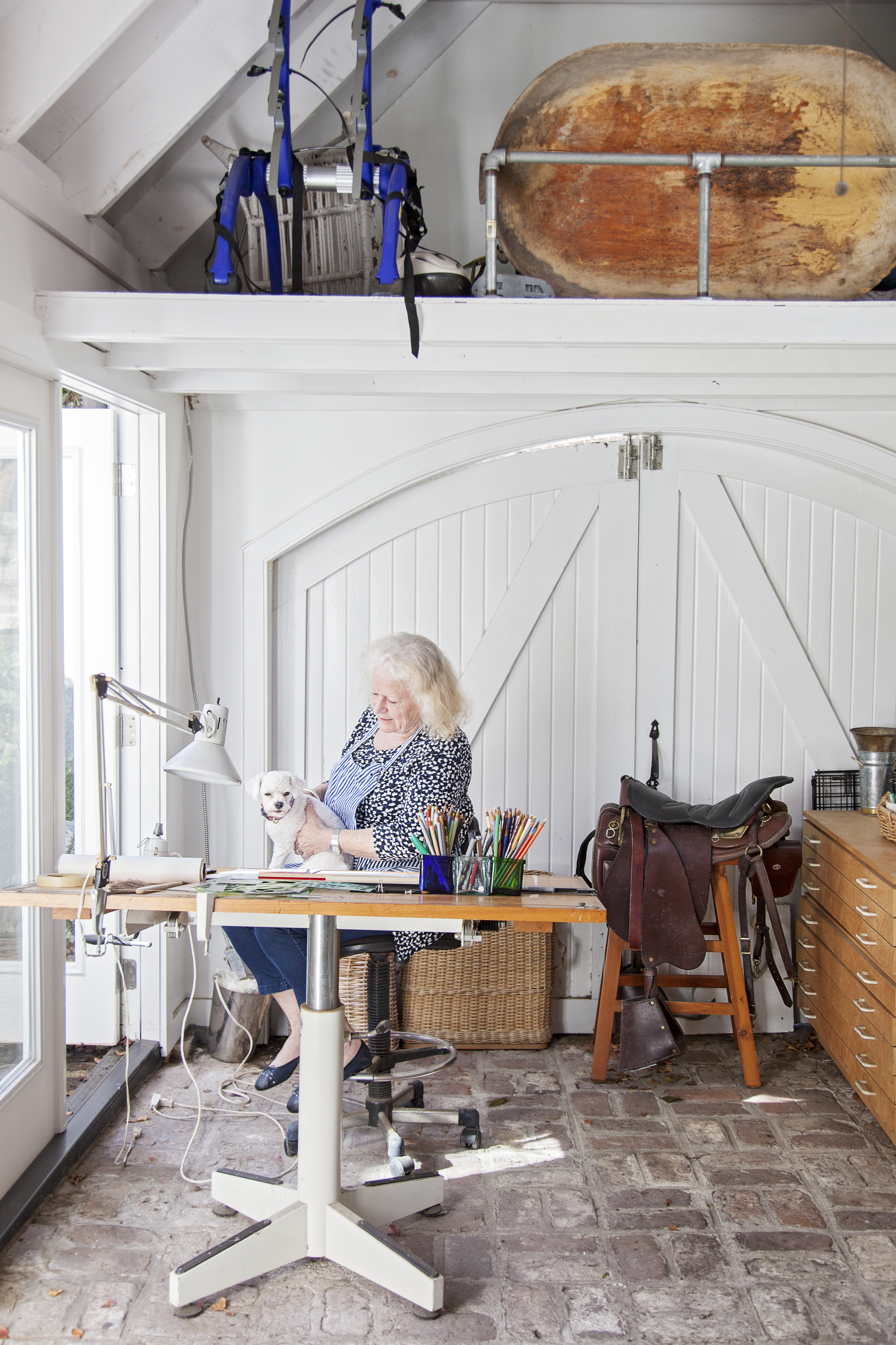 Creative Haven: Bigner spends hours drawing in the sunlit art studio out back. Last year, she replaced the petite building’s French doors with high-end vinyl-clad versions that are also super low-maintenance: they’re waterproof, don’t rot, and can be easily hosed off.