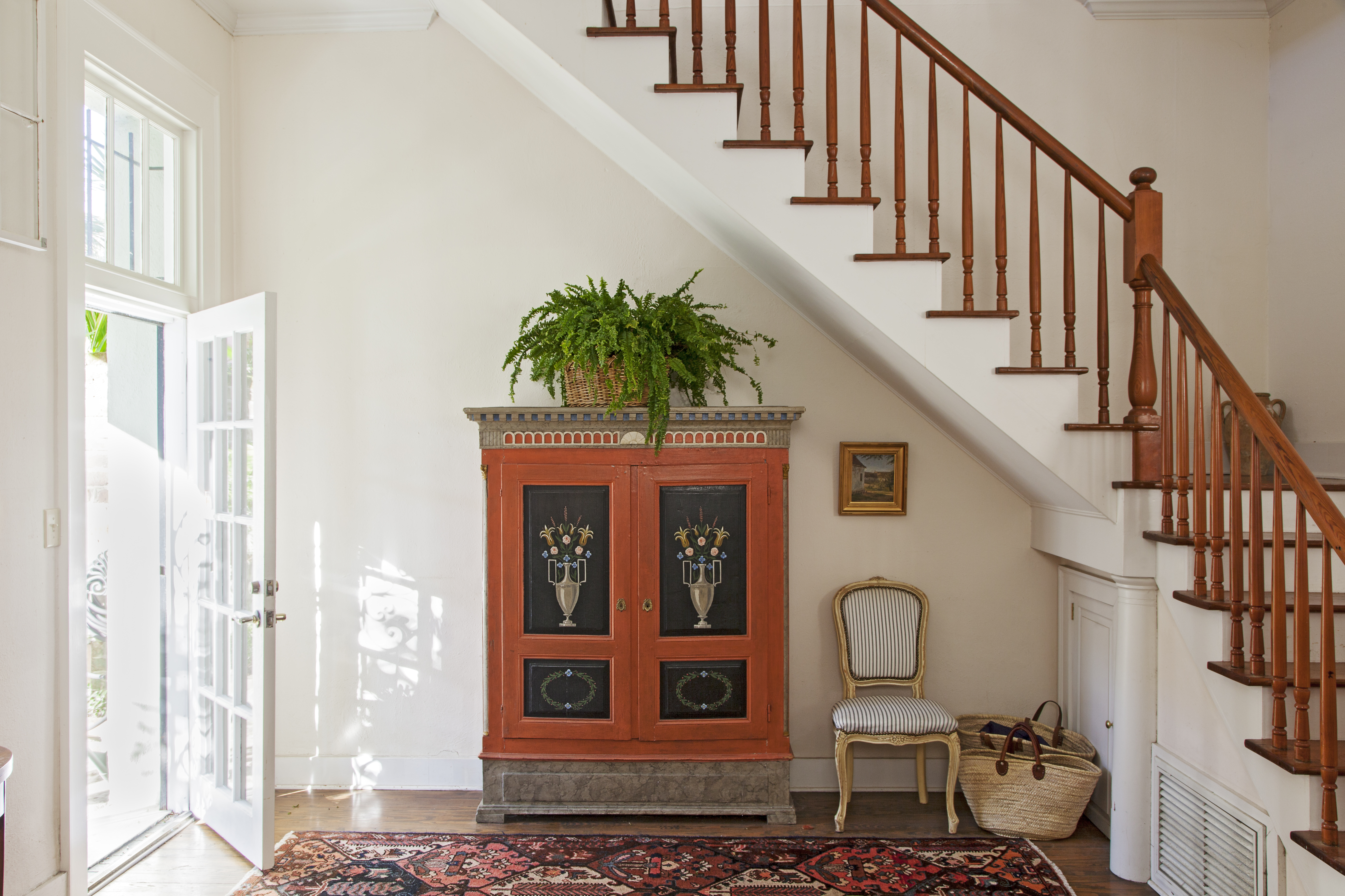 Personal History: Once belonging to her grandmother, this mid-18th-century peasant-style Louis XVI cabinet was gifted to Bigner by her parents on her 18th birthday. It looks right at home positioned next to a painting of the North Jutland farm where her grandmother grew up.