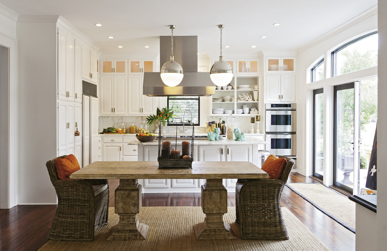 “Painting the window frames a contrasting color really draws the focus outdoors, to the botanicals and  the marsh.”