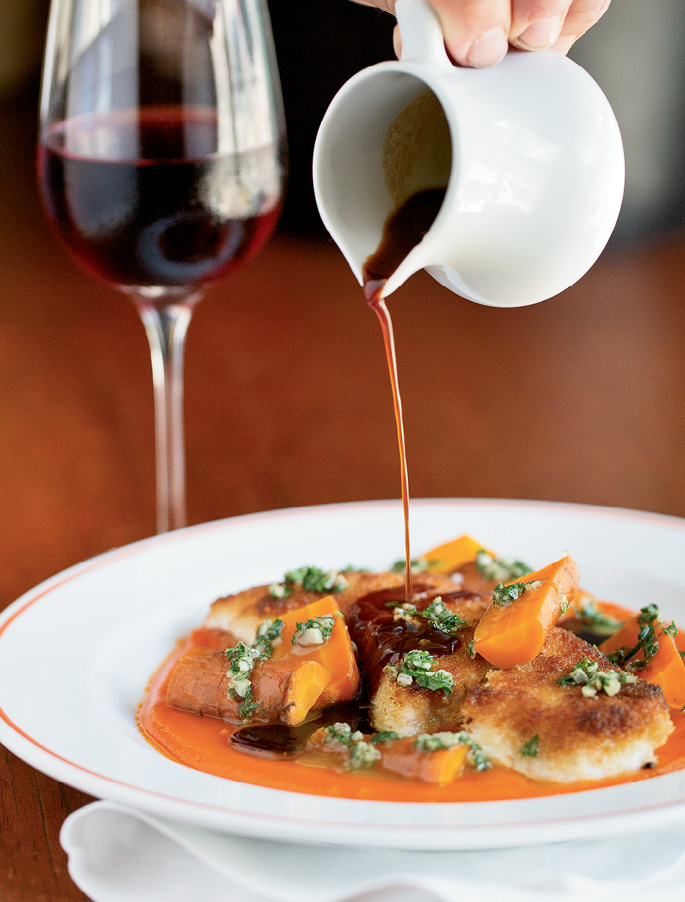Pour it on: A drizzle of rendered bone-marrow salsa verde over wreckfish with pureed and cut carrots