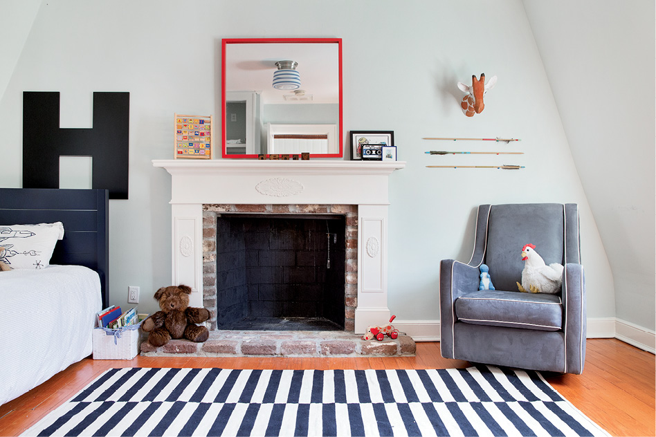 Henry whips up some pretend grub in his playroom, which retains its 18th-century footprint, as does his adjoining bedroom.