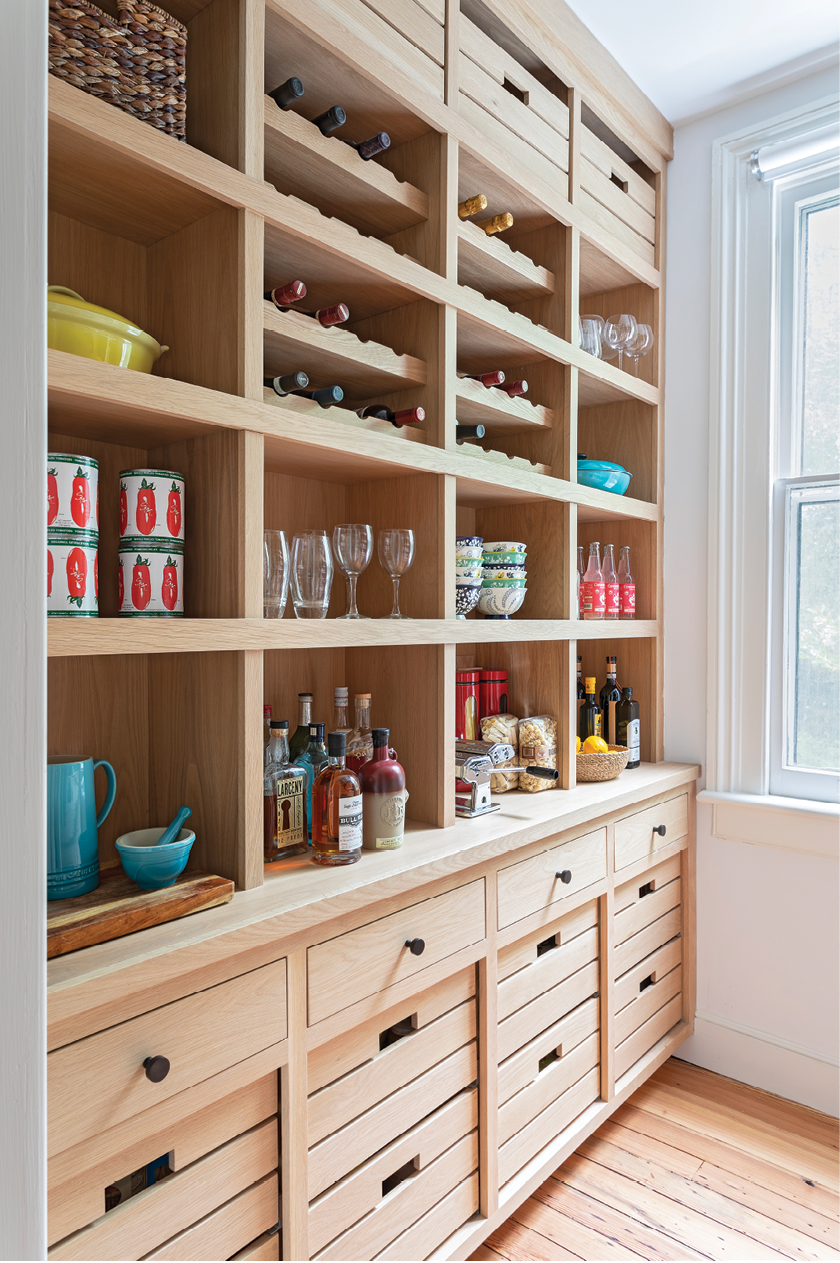 For everything else, the nearby pantry’s floor-to-ceiling cabinetry provides ample storage space.