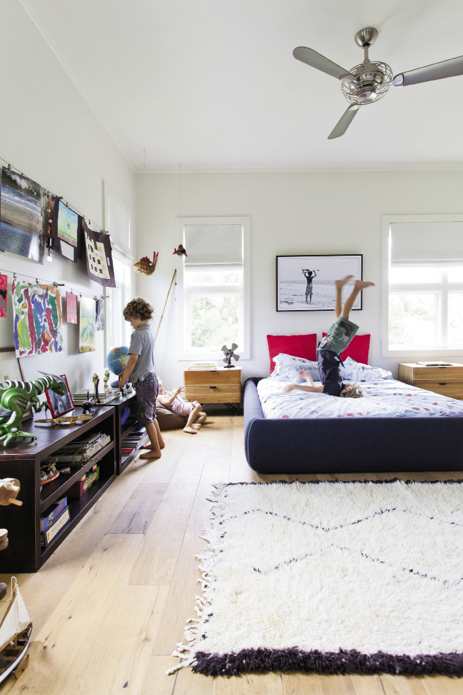Max&#039;s room is dressed with rows of art projects and a framed surfer pic