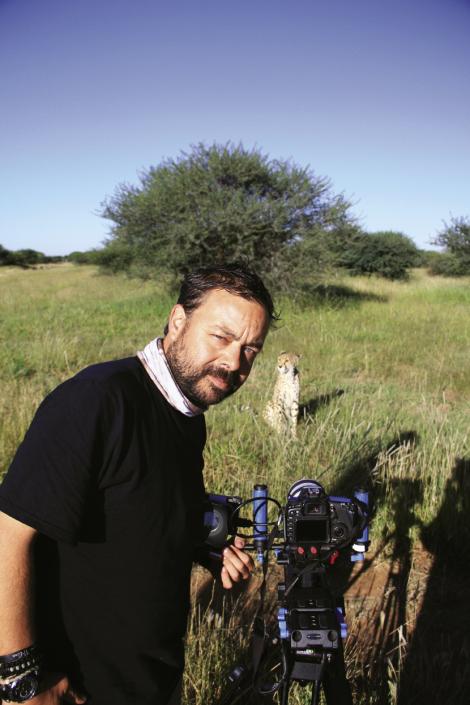 One Cool Cat: Barnhardt looks a bit trepidatious within yards of his wild subject at the Cheetah Conservation Fund in Namibia, Africa. “People often think of a cheetah as a smaller animal, but they are twice as big as you think, and their ‘purrs’ are thunderous,” he says. “Being that close to something that could kill you is soul-shaking.”