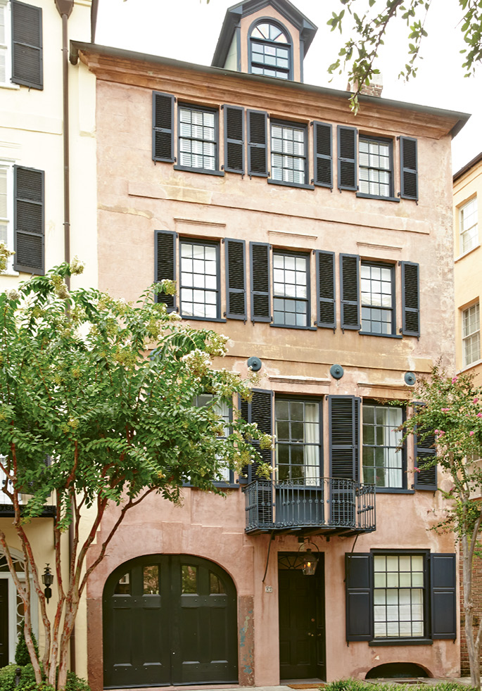 CLASSIC BEAUTY: The Pollaks’ townhome on East Bay Street; the façade features a balcony forged by legendary ironworker Philip Simmons.
