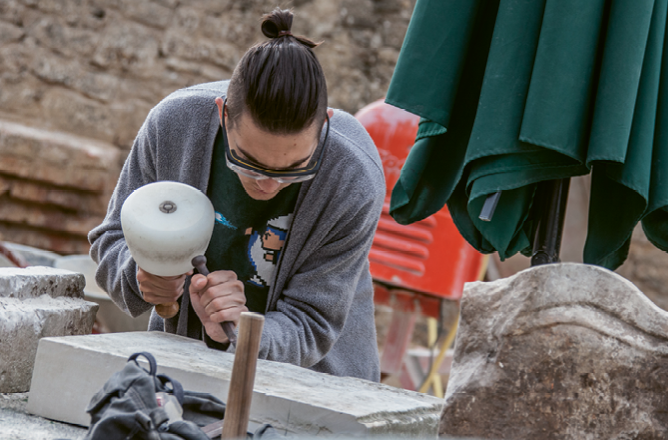 Students from the American College of the Building Arts, including Sam Friedman helped design and build the ”Charleston Place” monument on the grounds of a German palace.