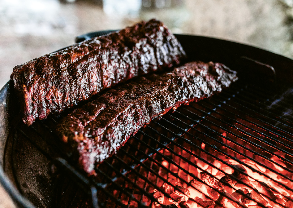 Hagood advises slicing the ribs in one- to two-bone pieces, letting the bone guide the knife rather than cutting down the center of two bones, to provide a full “section” of meat.