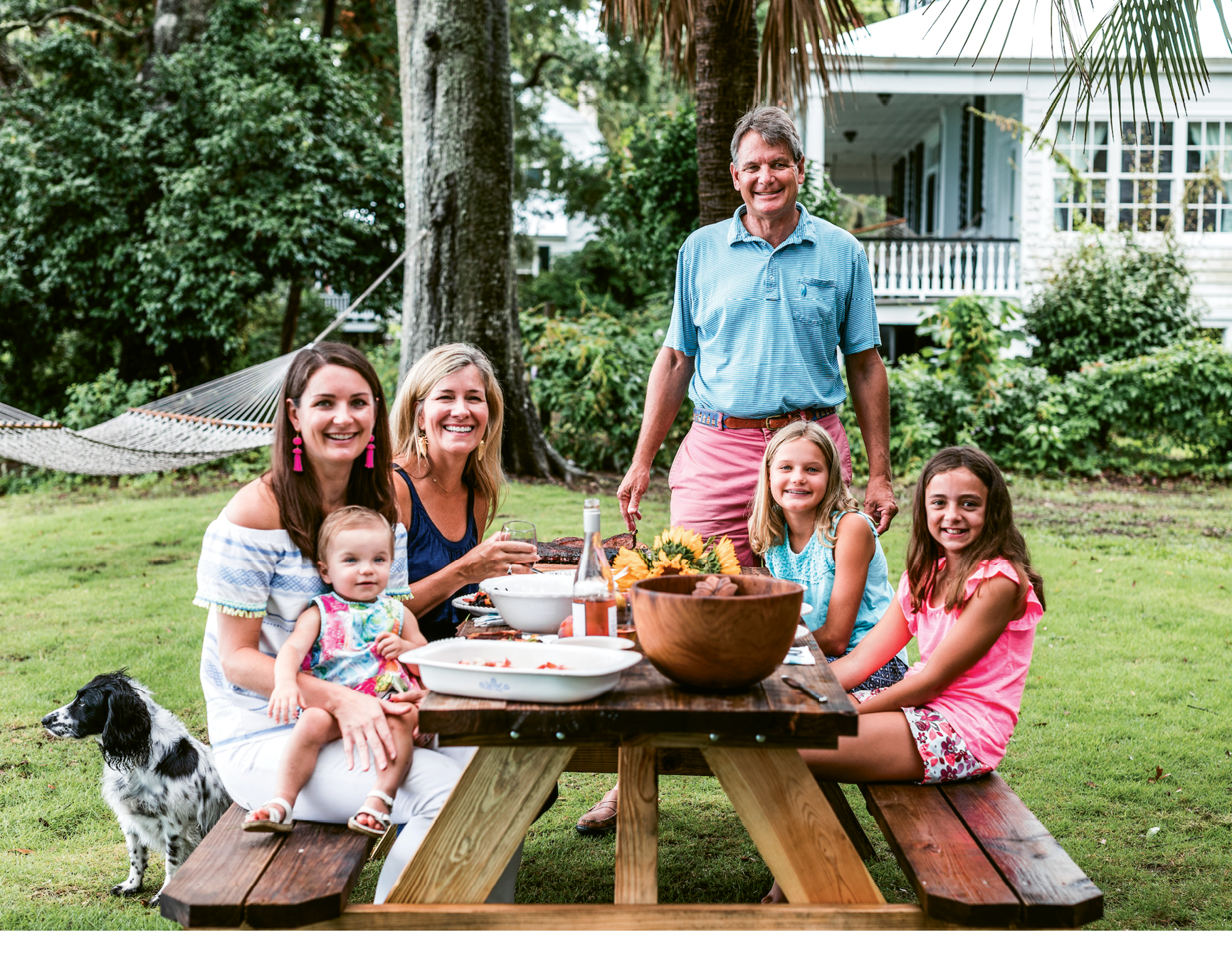 Jimmy Hagood, his wife, Anne Marie, and daughters Catherine and Mary Neill (with granddaughter Louisa) gather with friends on the river.