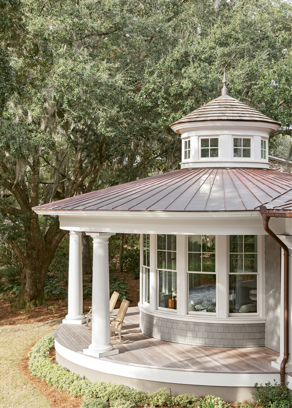 Each porch around the property has the requisite rocking chairs.