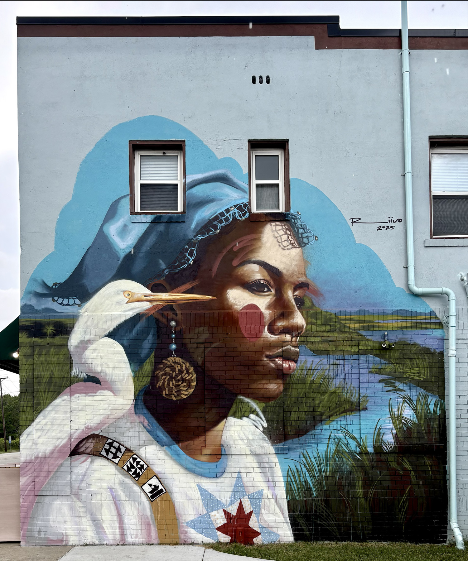 Painted on a Spruill Avenue building, Kruuk’s Gullah is intended to the reflect the roots, heritage, and preservation of sea island culture.
