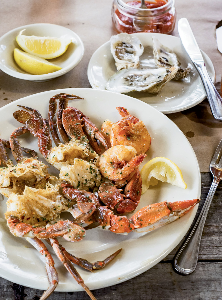 “Single Lady” oysters are served on the half-shell, along with crab and shrimp prepared in Albany’s spicy, garlic-crab style.