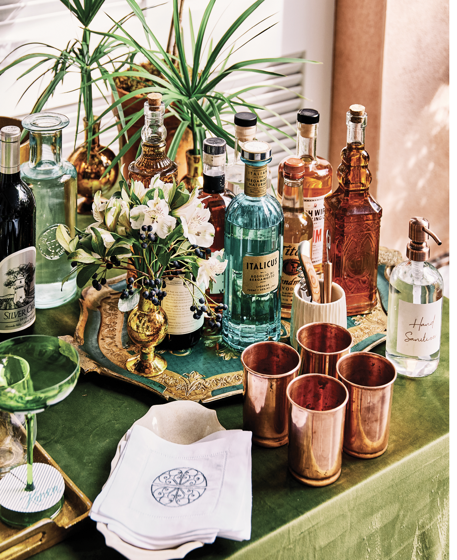 Having sanitized their hands and wearing masks, guests pour their own drinks. The embroidered napkins are available in the BEETLE + SOIREE pop-up at 70 Queen Street.