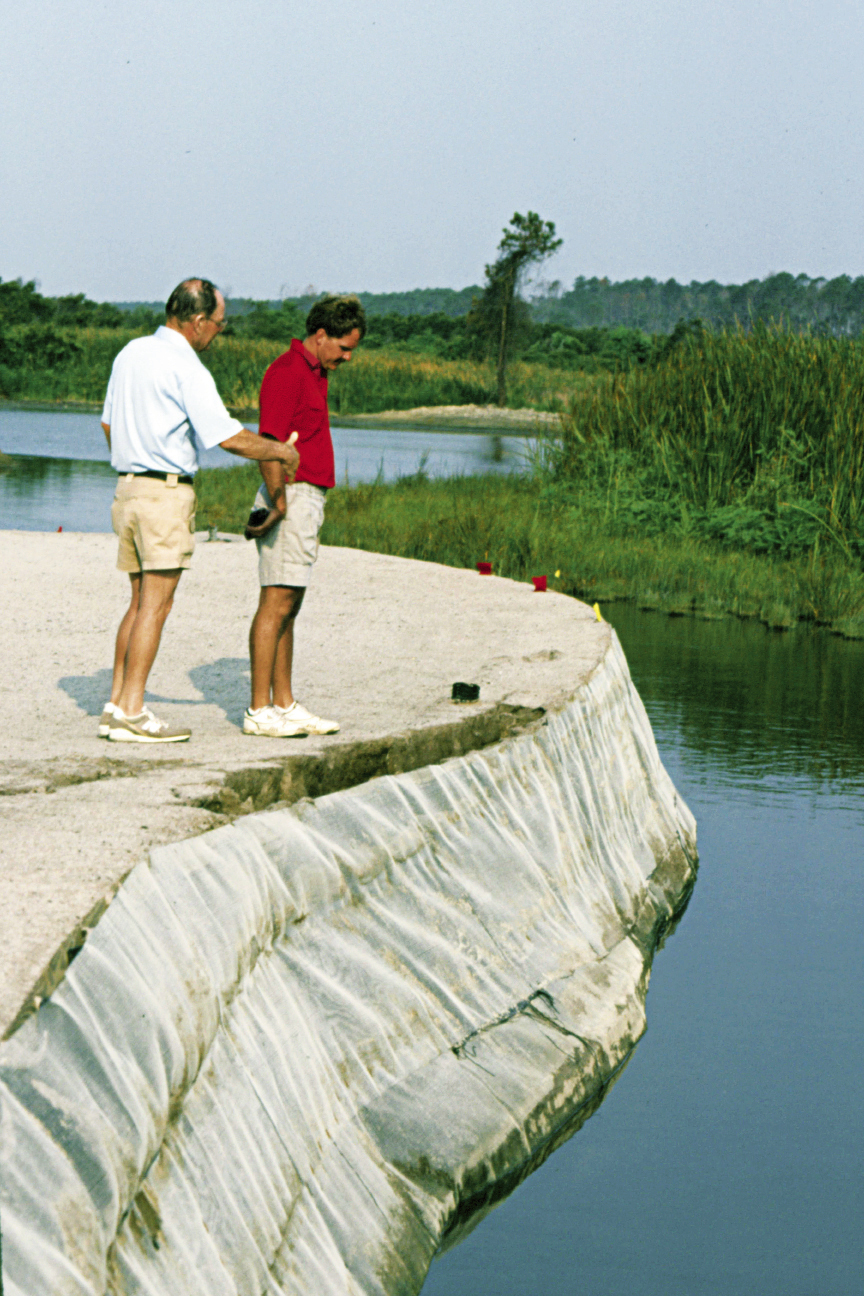 Dye working with project manager Jason McCoy on 13, described as “the most difficult hole on the inward nine”