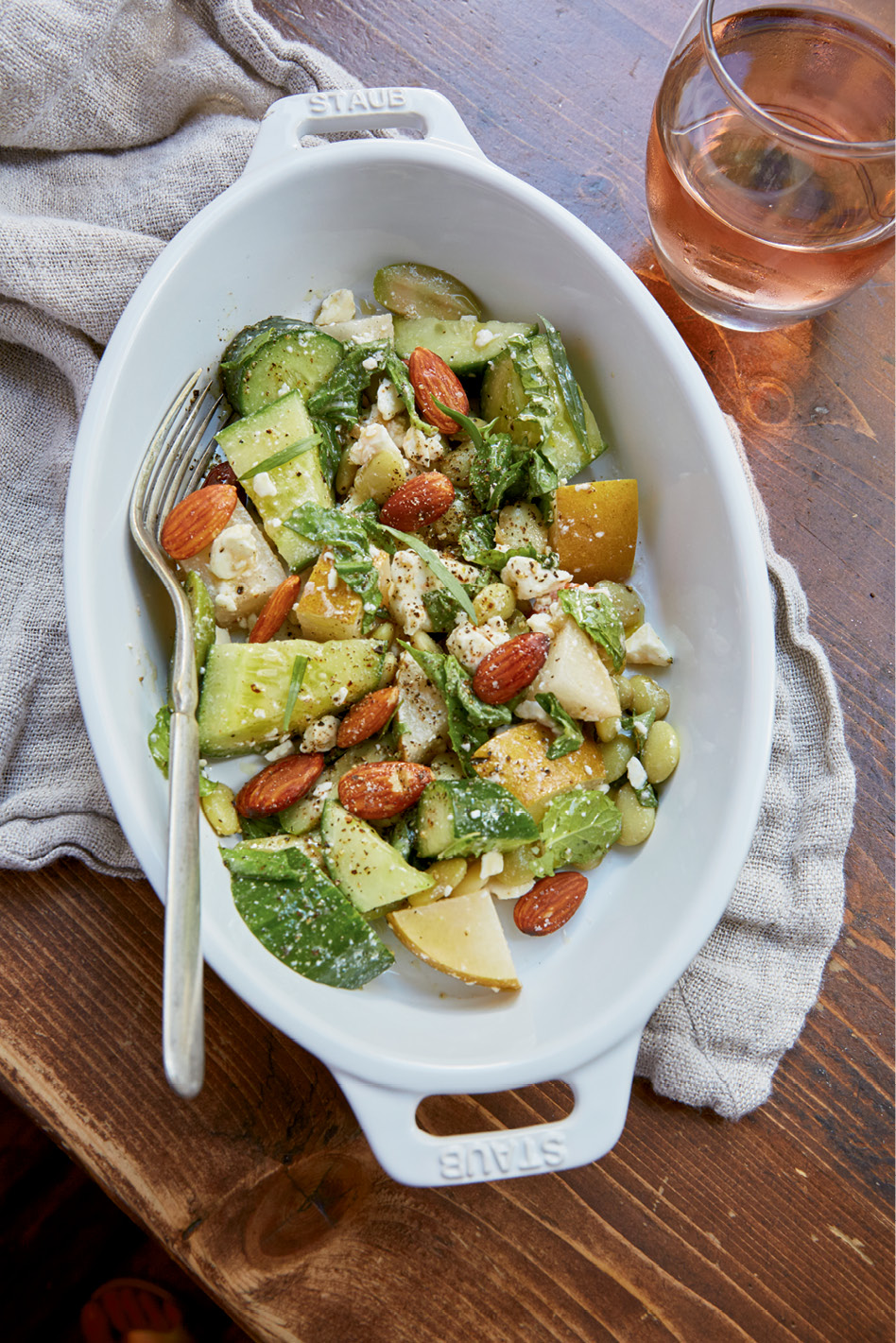 Mix It Up: Daily salads are combinations of whatever fresh ingredients Lira has on hand, like thickly sliced cucumbers tossed with squash, almonds, and feta.