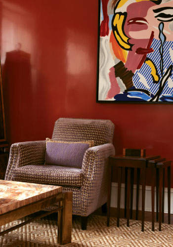 Salvator subdivided it. This half’s sofa allows for stretching out to watch football—the homeowner’s fourth passion