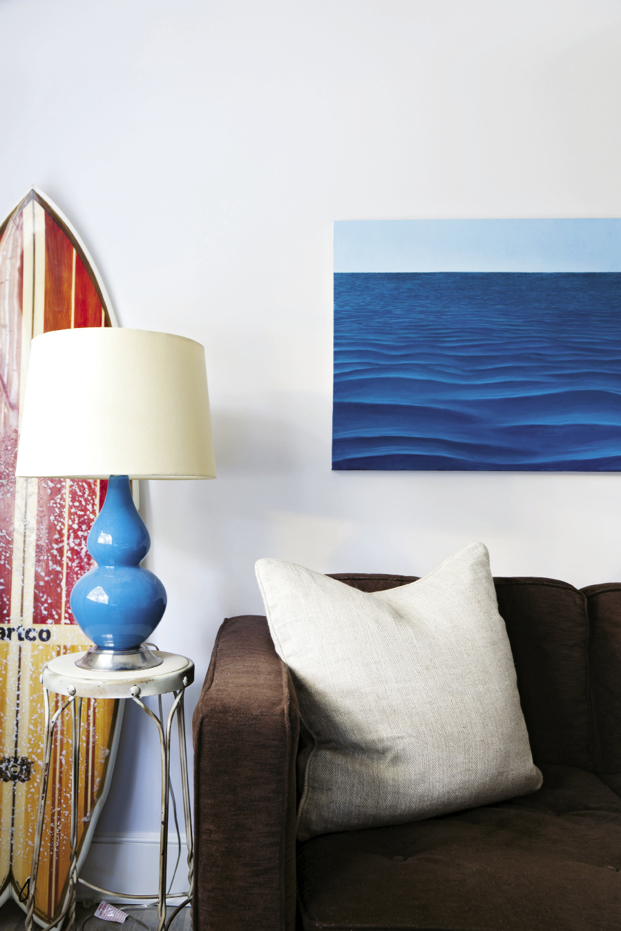 and replaced the appliances. A trio of windows open to a floating bar on the adjacent back porch.