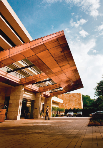With its handsome façade and bellman at the ready, The Umstead is the picture of luxury. Luckily, it’s also family-friendly, with a pool that invites guests to float the day away. Photograph courtesy of the Umstead Hotel