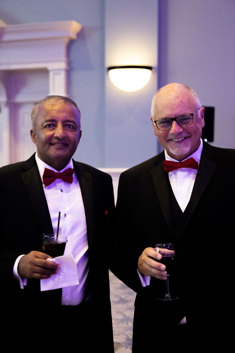 Ik Jumani and Keith Pridgen pose for a photo.