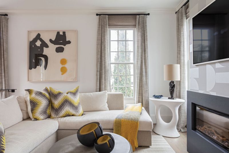 The deep blue Jiun Ho dining table and chairs pair with a walnut console, all from Dennis Miller New York. “The navy and brown are both very masculine,” says Brown. “There’s a great vibration when the two colors intersect.”