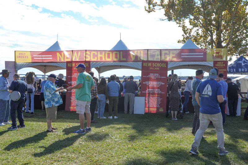 The New School Village, featuring Tank Jackson of Holy City Hogs, Aaron Siegal and Taylor Garrigan of Home Team BBQ, and others