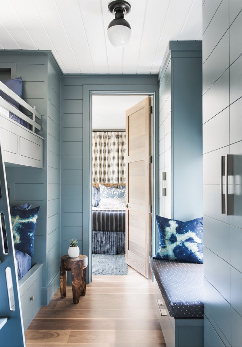 Custom bunk beds by William C. Pritchard Co., painted in Farrow &amp; Ball’s “Inchyra Blue.”