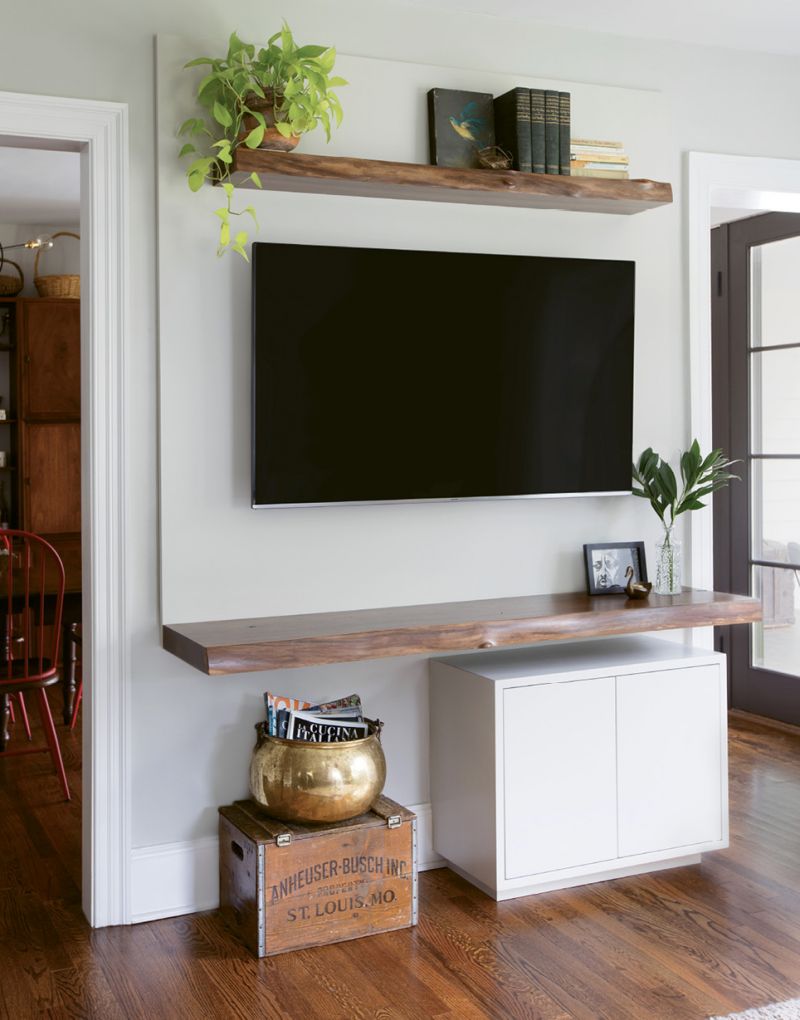 Crafted by local carpenter and friend Dan Perrin of Perrin Woodworking, this custom media console echoes the look and feel of a mantel.