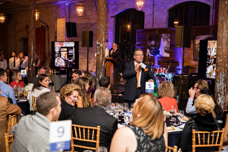 Tom Crawford commands the room during the live auction.