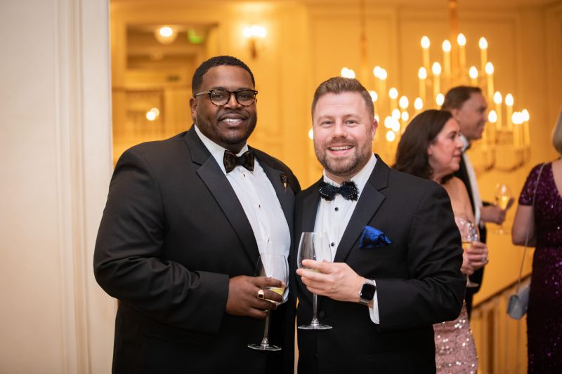 Participants Cory Robinson and Steven Aro posed for a photo at An Epicurean Affair.