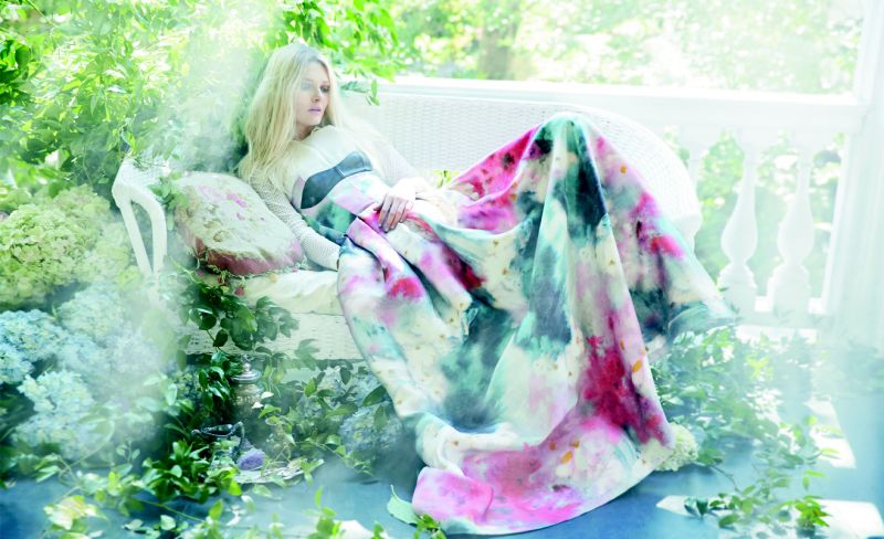 IN FULL BLOOM: Honor print bustier gown, $3,400 at honornyc.com; Akris Punto mesh sleeve button up, $395 at Rapport; silver tea cups and spoons courtesy of Polished! and silver pitcher courtesy of OOH! Events