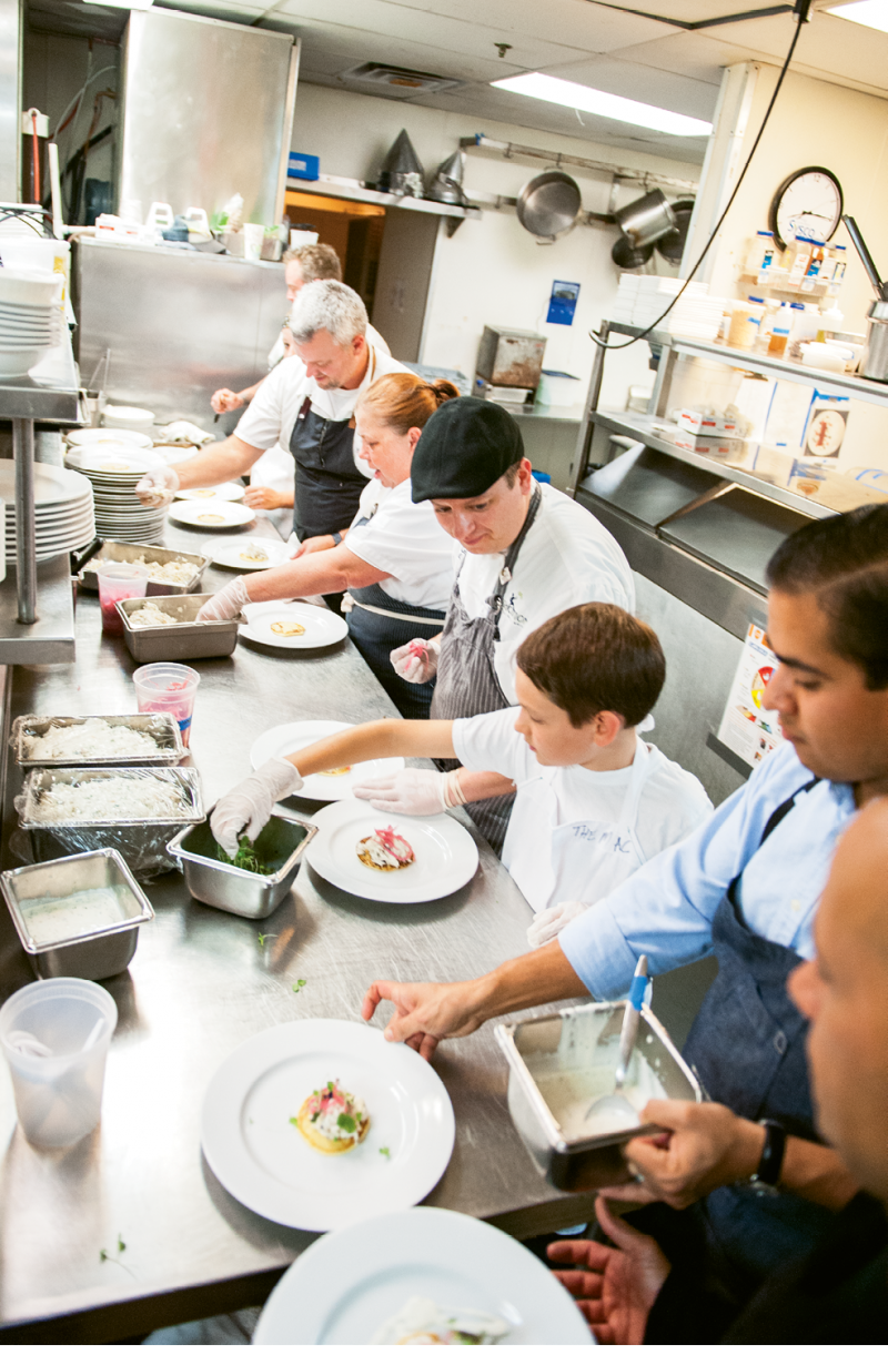 On the line (from left): Big Chefs Bacon, Weaver, and Kelly;  Little Chef Jacob Kestenbaum; and Big Chef Toscano