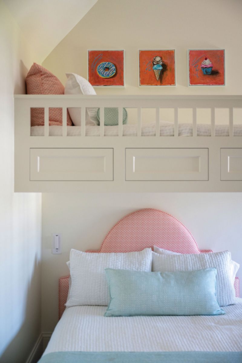 While the artist says she rarely buys art to fit a space, she will paint to fill a wall. “In the girls’ room, there was this blank space above the bunk bed, so I did these three small paintings—a donut, an ice cream cone, and a cupcake—to fill it.“