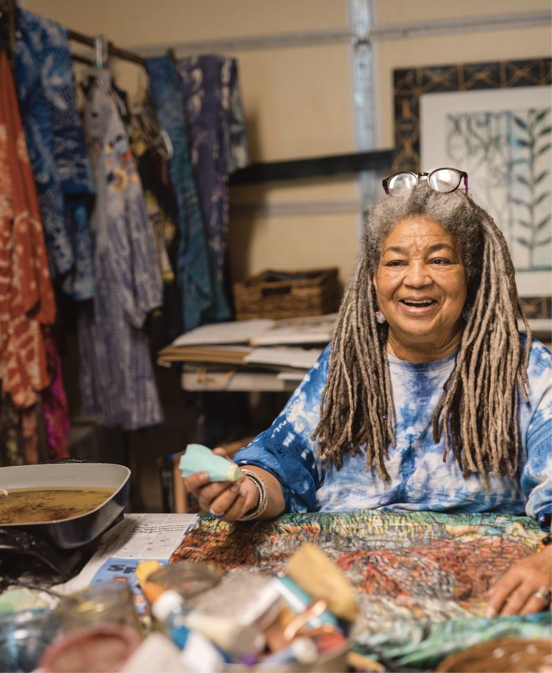 Textile artist Arianne King Comer in her garage work space.