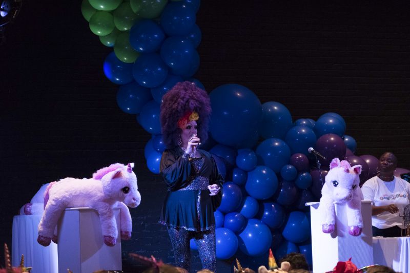 Hostess Patti O’Furniture addresses the crowd