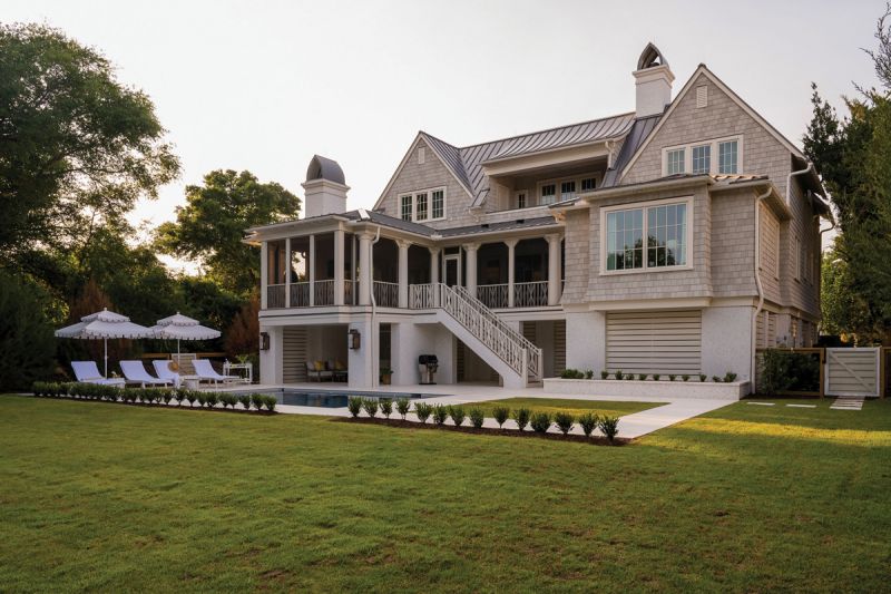 Island Life: Debby and Steele Alphin built this Atlantic Avenue beach house in 2021 as a place to spend their golden years. The main floor is a self-contained living area for the couple, while the upstairs provides plenty of room for their two daughters to visit with their families. Architect Amanda Orr managed to squeeze in an artist studio for Debby, whose paintings are sold through Atlanta Artist Collective and Serena &amp; Lily. Ample outdoor living spaces, including a pool, large lawn, and screened porch, allow for a connection to the neighboring maritime forest and ocean beyond.