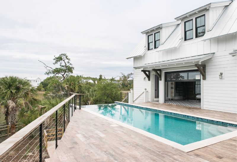 Mount Pleasant-based Aquatica Pools and Spas built the heated infinity pool, which overlooks the marsh and the Wando River.