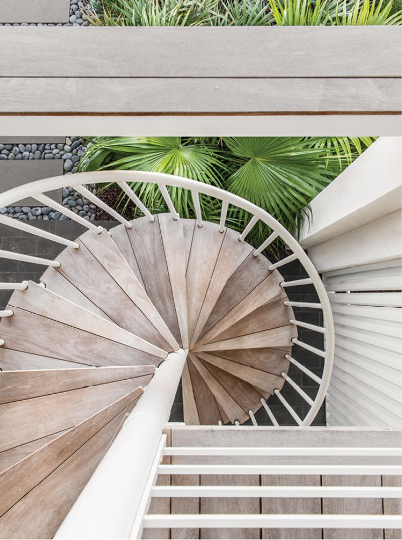 The spiral staircase within the courtyard leads to the first floor.