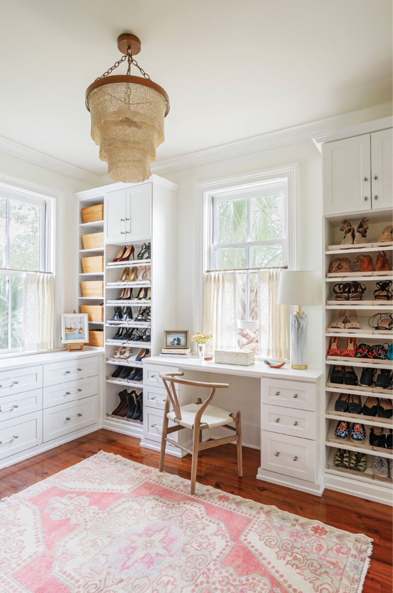 Organized Oasis: This small side room, designed by Inspired Closets, once functioned as a studio but had become a storage closet. “It was fun to take those spaces that had become a place to put junk and rethink them, creating a whole second closet for her,” says Elebash. Adding shelves and a built-in desk from Crate &amp; Barrel turned this under-used space into a favorite spot for the homeowner. “I use it as my home office, too,” she says. “It really is a luxury