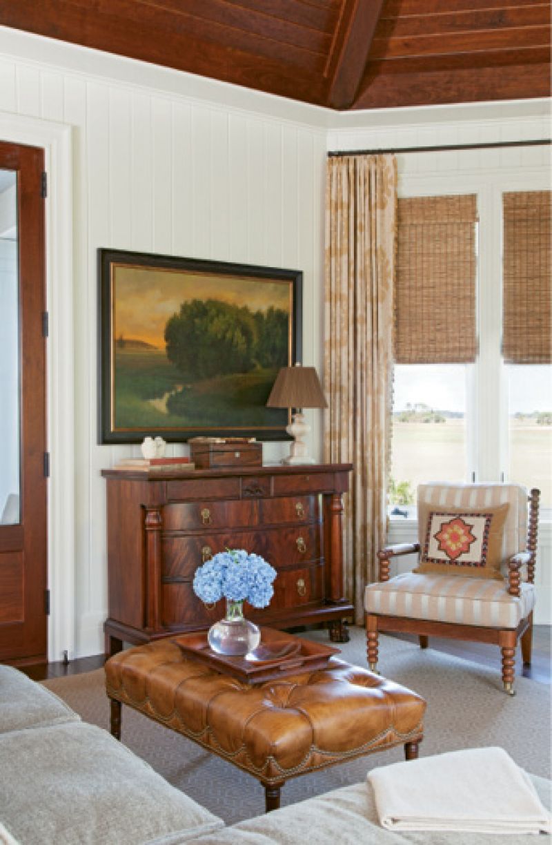 The handsome den with its vaulted wood-paneled ceiling
