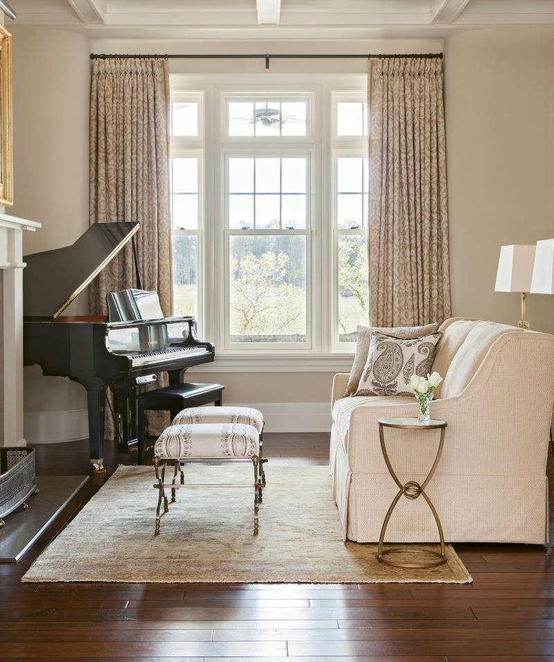 in harmony:  The Lyles spotted these ottomans for the music room on a trip to the Atlanta Decorative Arts Center, then had them covered in an embroidered fabric by Zimmer + Rohde.