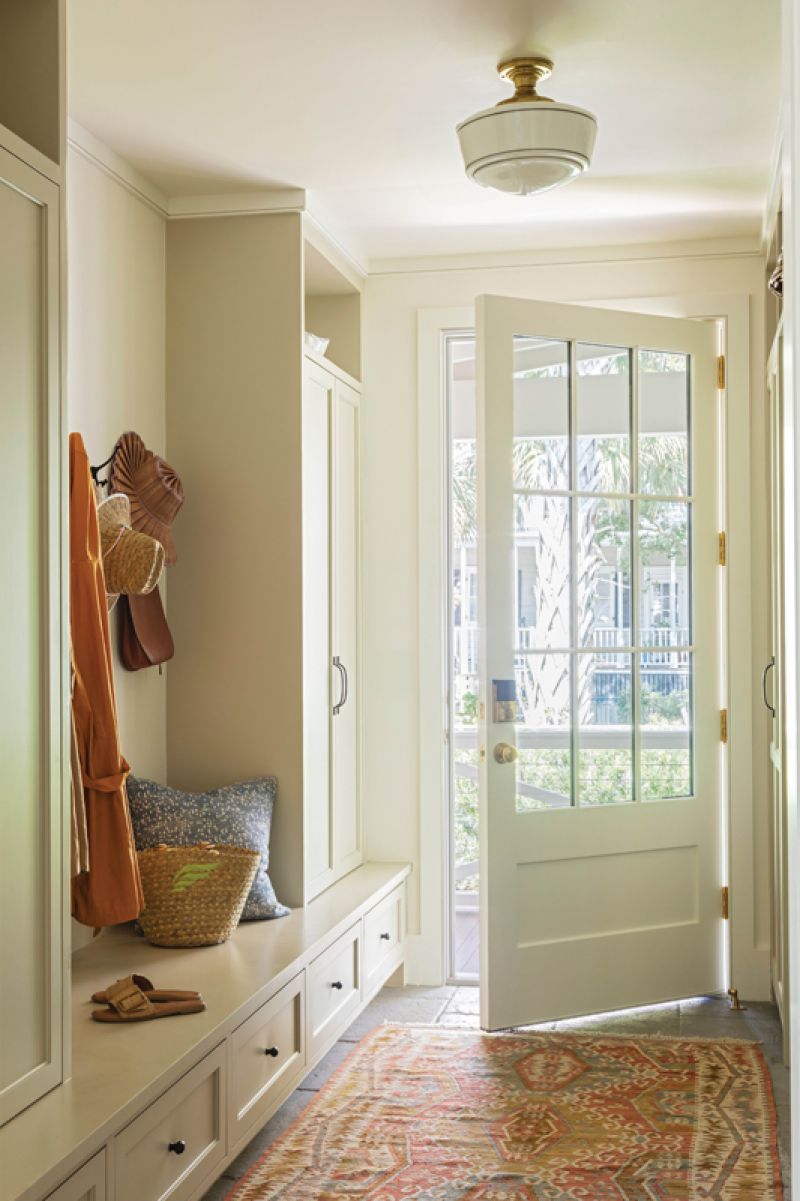 A mudroom leads from the detached garage to a large laundry room/butler’s pantry