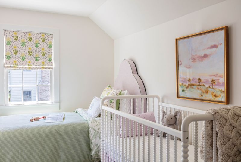 The nursery features a Jenny Lind crib and a daybed.