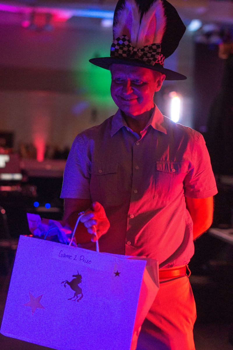 Michael Lepson won the second prize of the night, the “Just a Little Tune Up!” package.